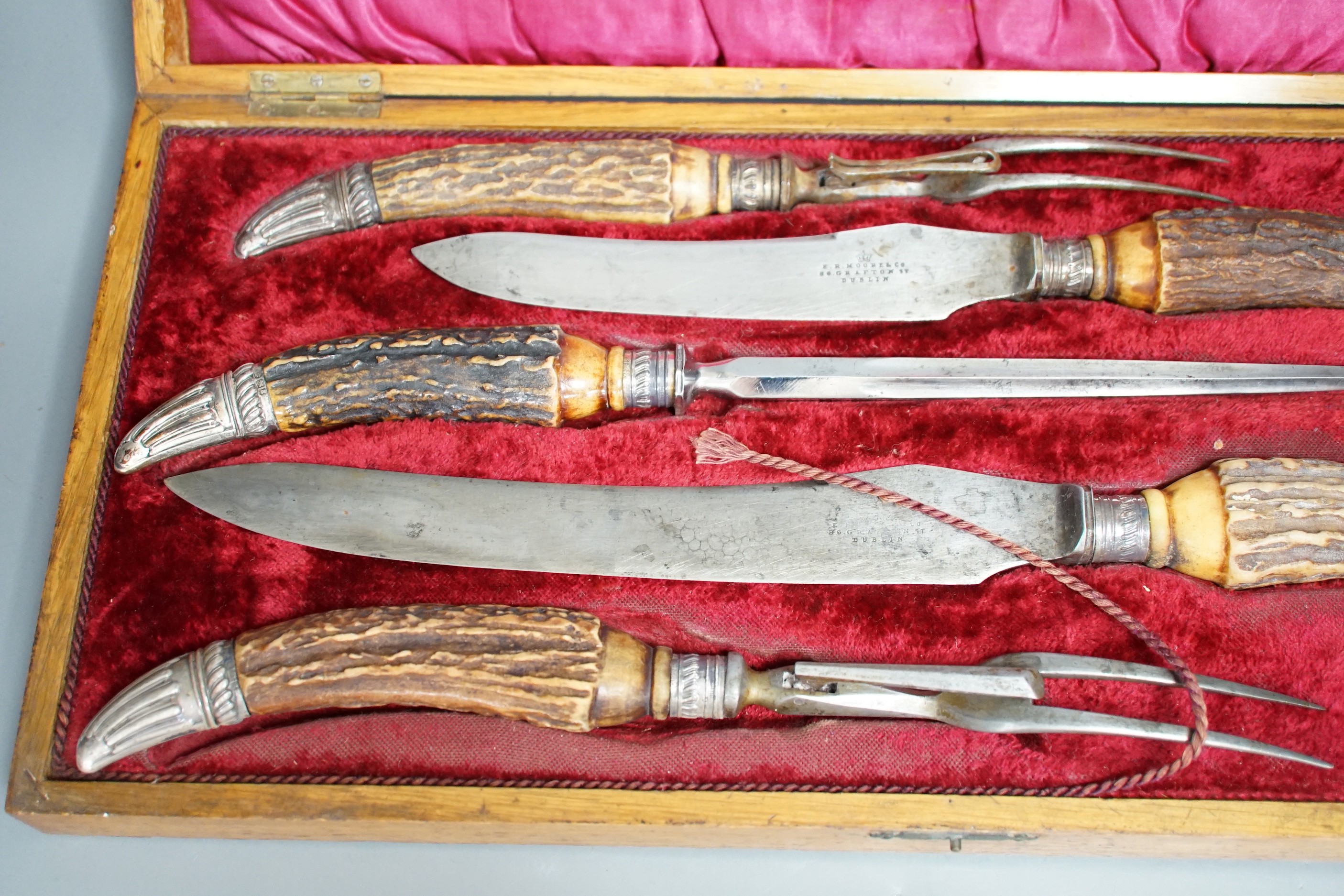 A Victorian E.R. Moore & Co. cased horn handled five piece carving set